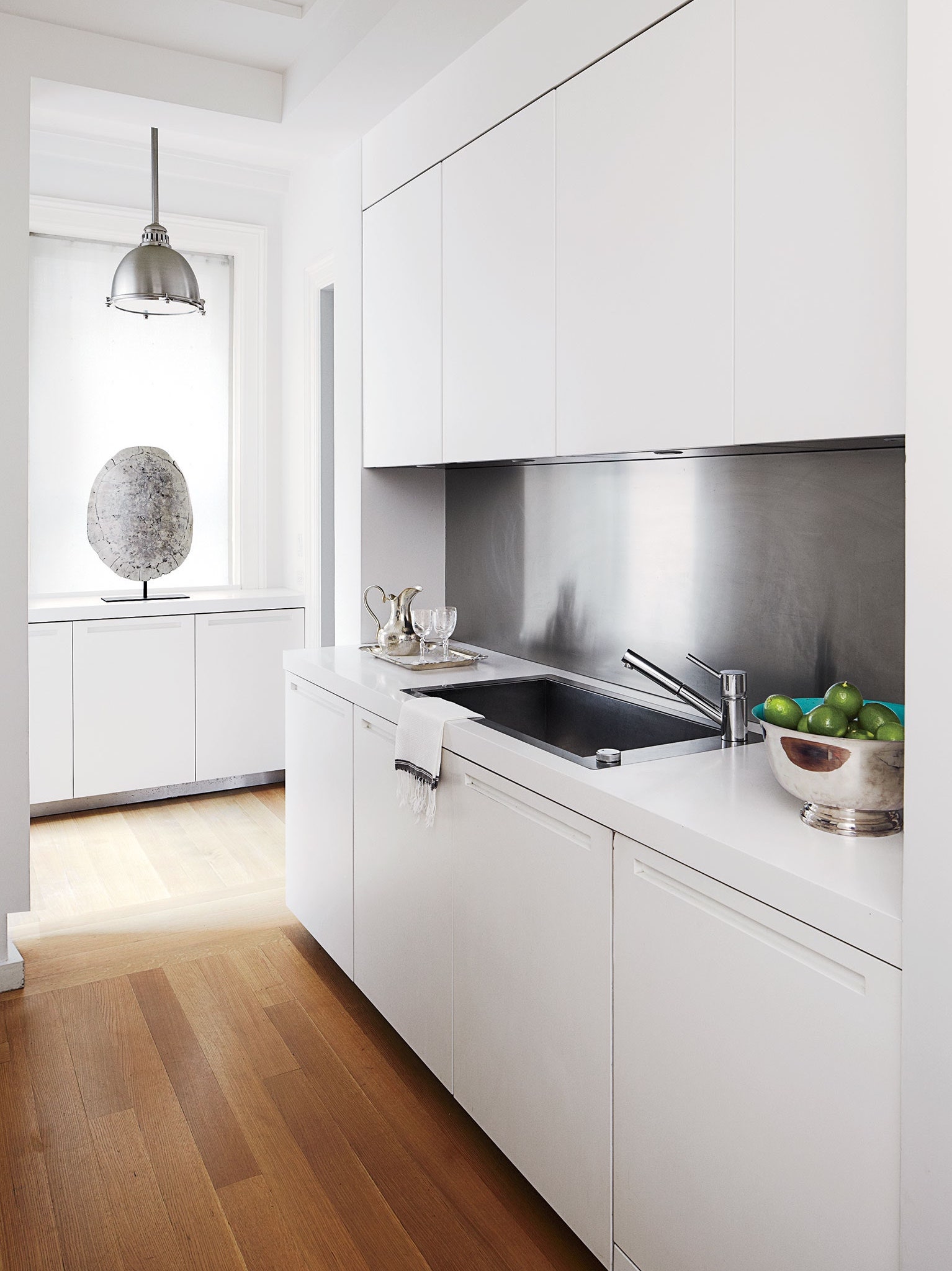 white minimalist modern custom luxury kitchen by residential interior designer austin texas